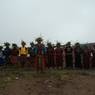 Bro performers performing dance facing towards Guru statue during Chha festival