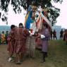 Strong gentlemans about to change the dancer inside the Gonmo costume