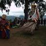 Lead master (chhampon) Gonpo & Gonmo dances by side of temple