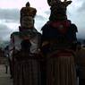 Gonpo and Gonmo standing infront of Guru statue and people gets blessings from there