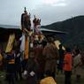 People in line receiving blessings from Nubchham masks