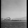 Northeast face of Potala from a distance, with marshland in foreground. Copyright Pitt Rivers Museum, University of Oxford 2001.59.8.12.1