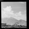 Potala seen at distance from southwest, with forested foreground. Copyright Pitt Rivers Museum, University of Oxford 2001.59.8.5.1
